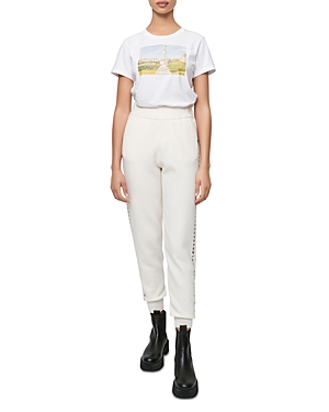 Maje Grommet Trimmed Jogger Pants In Ecru