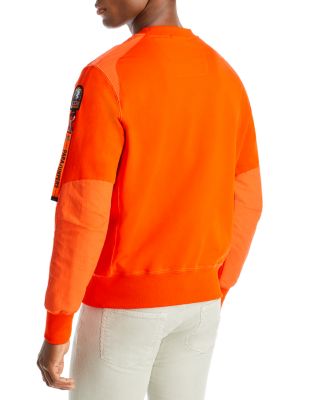 orange designer sweatshirt