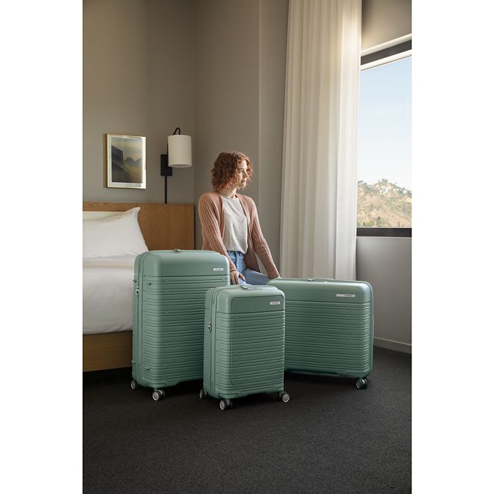 Shop Samsonite Elevation Plus Medium Glider Suitcase In Cypress Green
