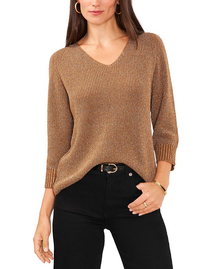 Three top quarter sweater