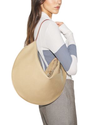 【関税込み】Tory Burch ベージュ Balloon エナメル バッグ Tory Burch Patent Leather Balloon Bag | Bloomingdale's