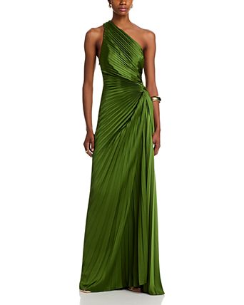 green designer dress A masterpiece of elegance and bold allure ,the emerald gown with its sculpted rose detail and daring slit, designed by the international @valdrinsahiti now exclusively available at @designersandus . #designersandus #dandus # The deep V Green Evening Gowns for Women