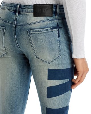 Logo Skinny Jeans in Mid Blue