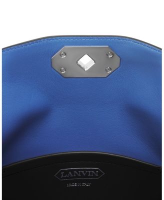  Compagnon Asymmetrical Leather Clutch Bag