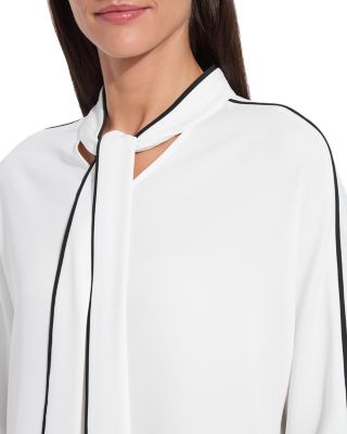 Daphne Dolman Sleeve Top