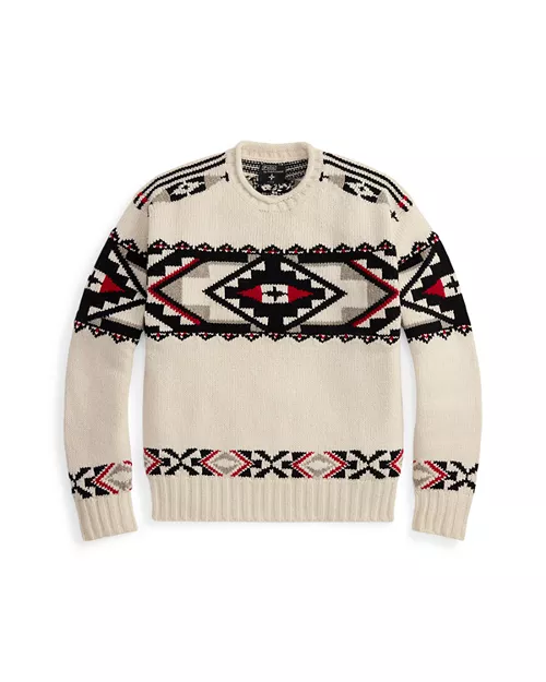 A cream-colored sweater featuring intricate black and red geometric patterns, showcasing a blend of cultural designs and modern fashion.