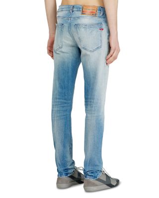 D-Strukt Slim Fit Distressed Jeans in Denim