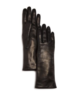 women wearing latex gloves