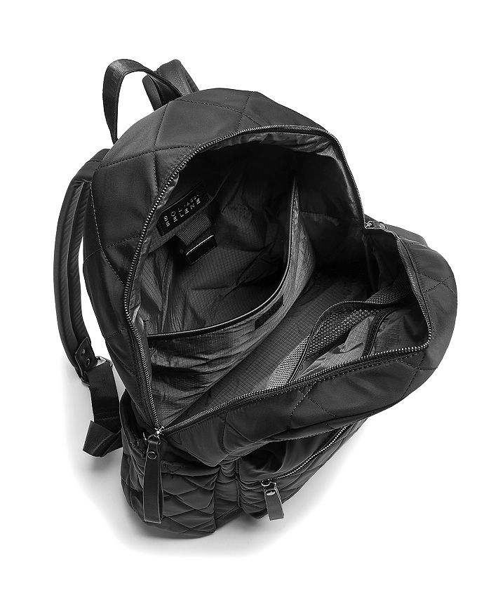 Shop Sol & Selene Large Motivator Quilted Nylon Backpack In Black/black