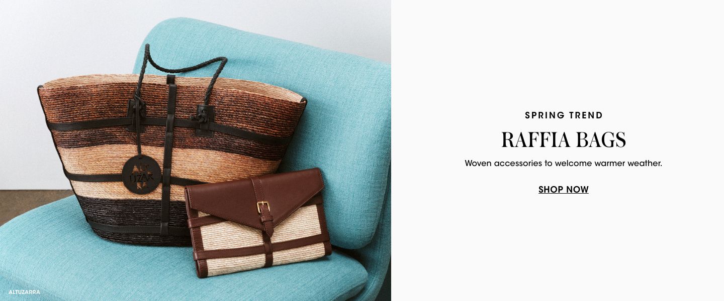 1 photo, of an Altuzarra large woven tote bag with three stripes of varying brown shades and one small woven clutch in light raffia and dark brown leather, both placed atop an aqua blue upholstered chair. 