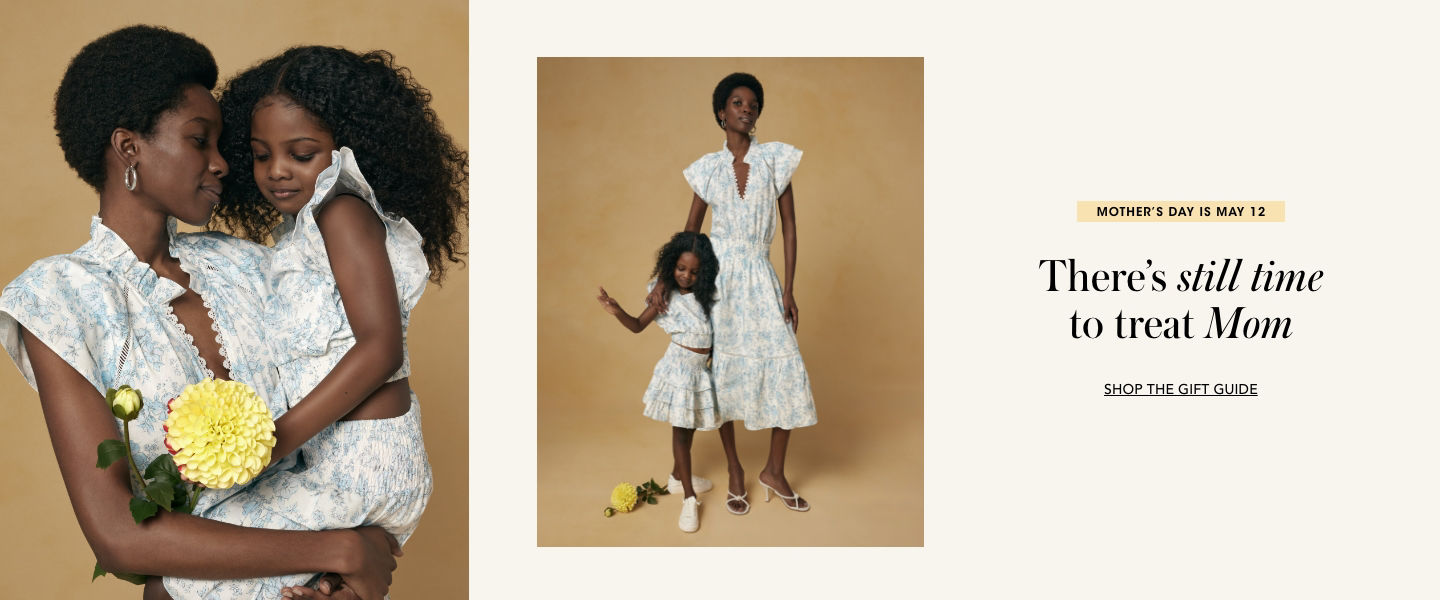 2 photos, of female model holding a young girl in her arms, both wearing matching blue and white floral Aqua outfits, 2nd of same duo in same outfits, the little girl standing next to the model with her arm around her.