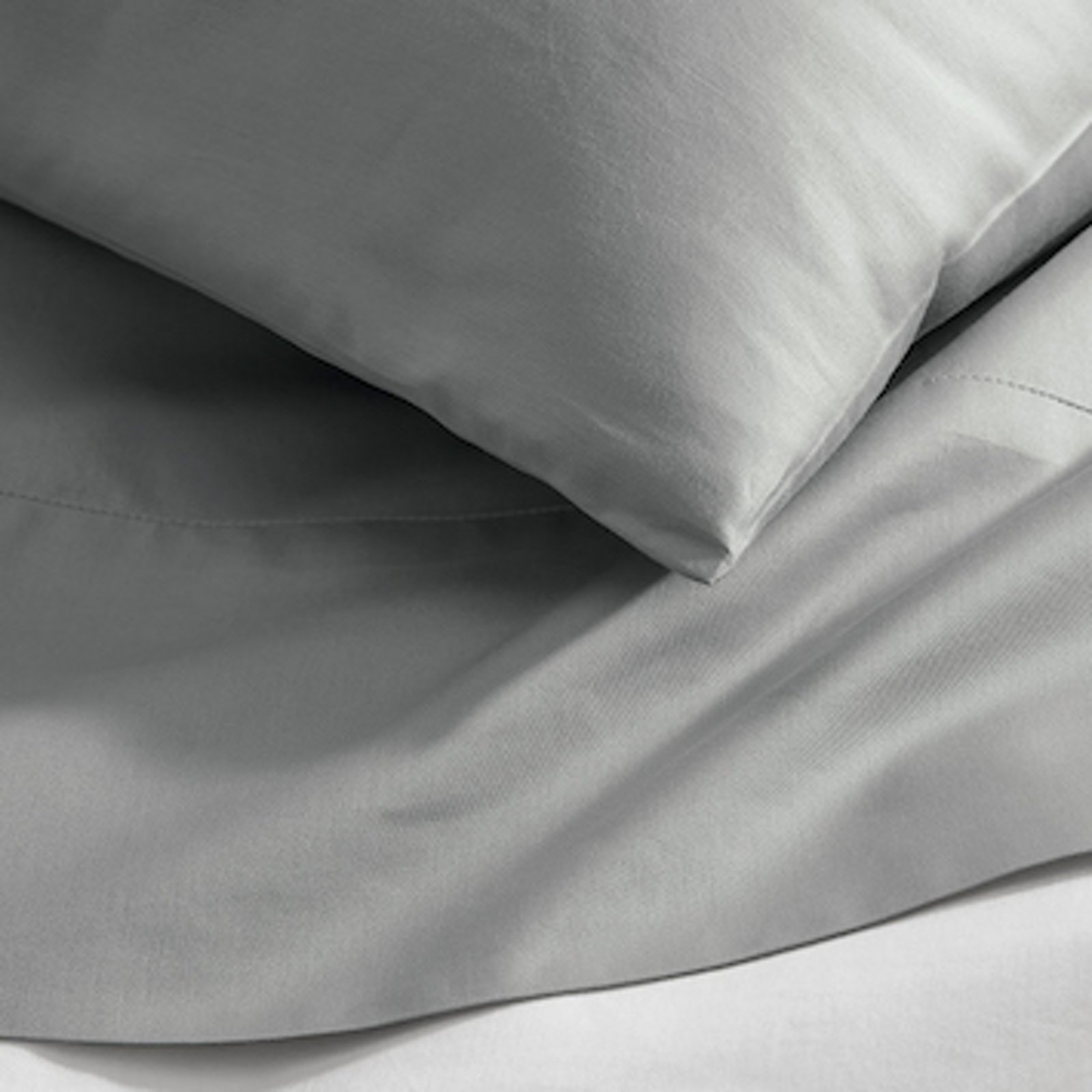 1 photo of Boll and Branch Percale sheets in gray.