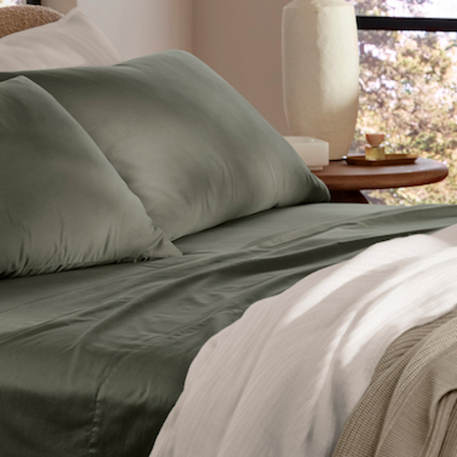 1 photo of Boll and Branch Signature sheets in green.