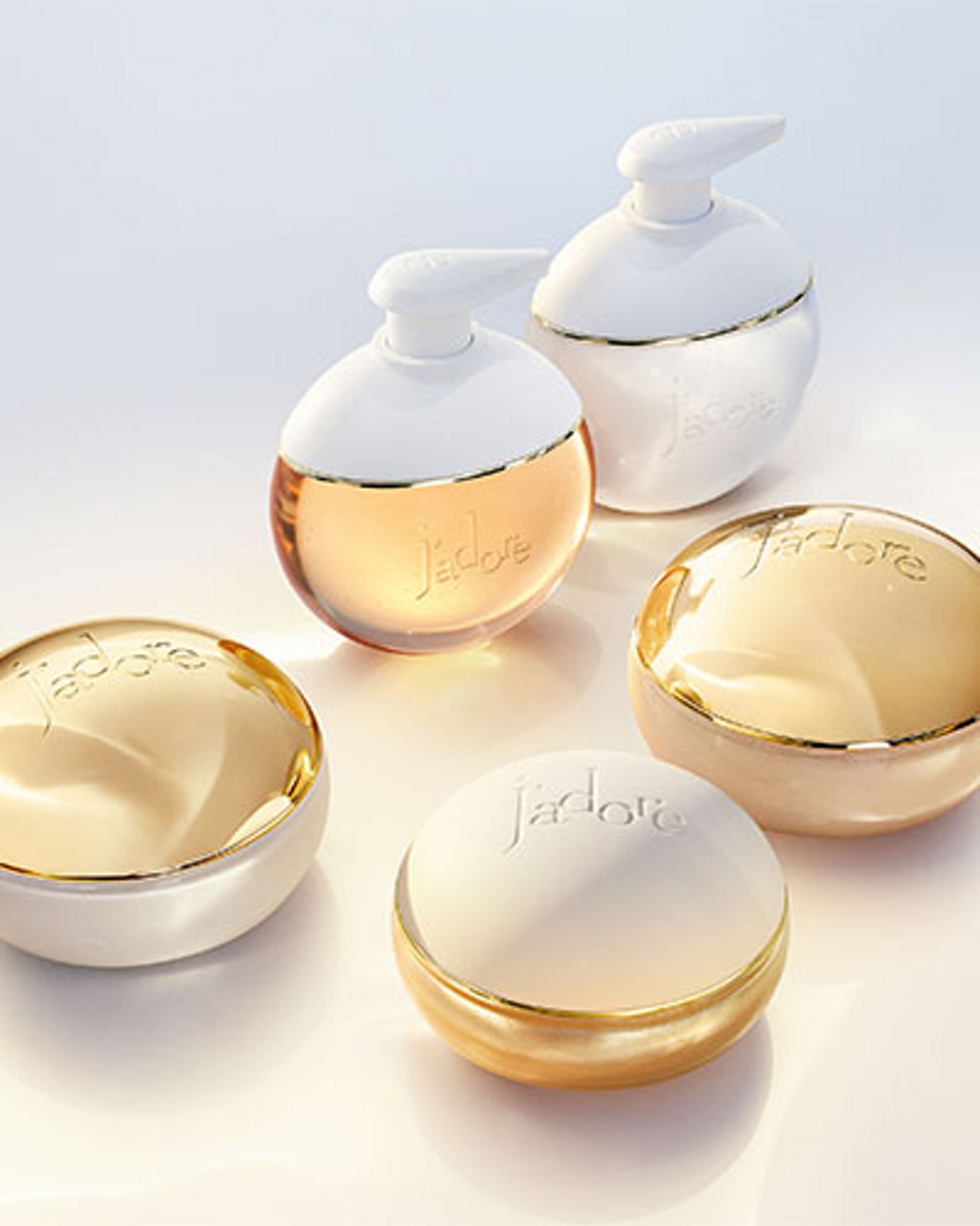 1 photo of 5 Dior Jadore Les Adorables bath and body items, 1st of Golden Gel, 2nd and 3rd of Shimmering Scrub, 4th and 5th of Shower Gel and Body Milk.