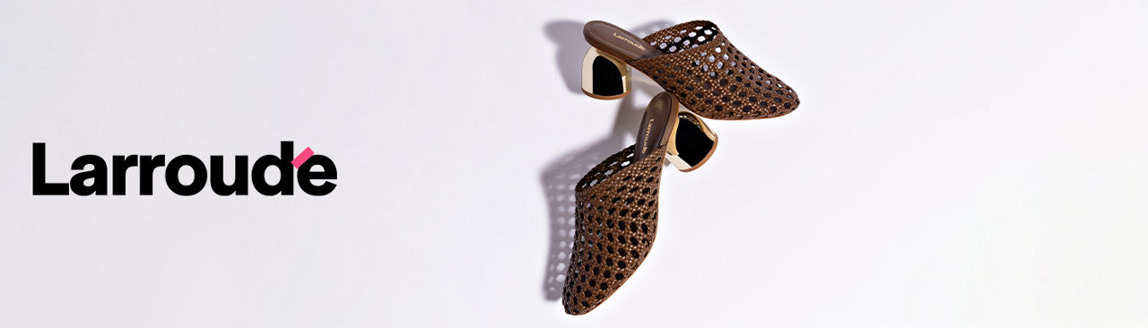 1 photo, of a pair of brown Larroude caged mules with gold platform heels.