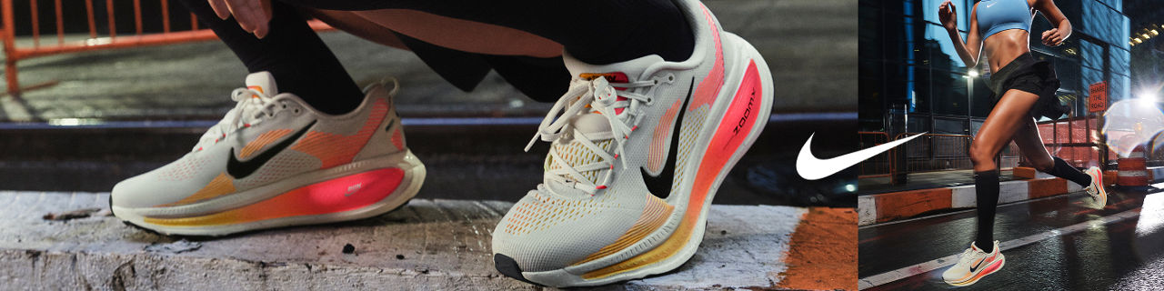 2 photos, 1st a closeup of feet in Nike sneakers in shades of neon peach, orange, and yellow, on a city street, 2nd of a woman from the neck down running on the street in a blue Nike sports bra, black shorts and the same sneakers.