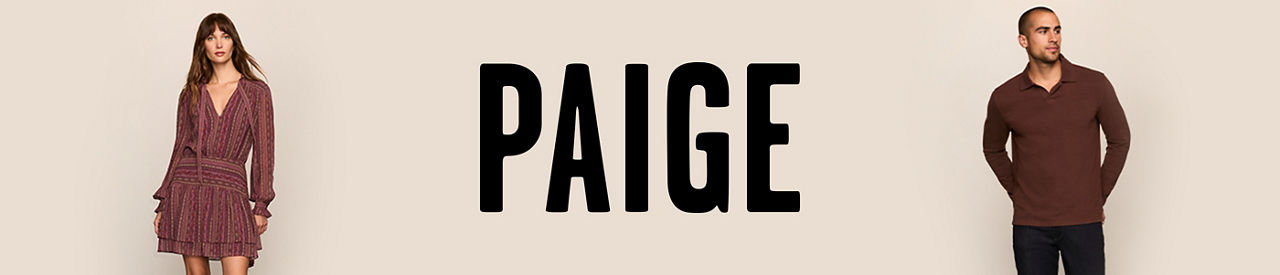 Paige. A woman in a Paige boho style reddish brown V neck mini dress and a man in a Paige brown long sleeve polo and black jeans.