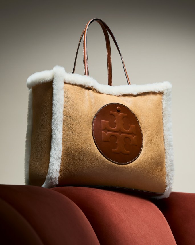 Leather and suede Tory Burch tote in beige and brown.