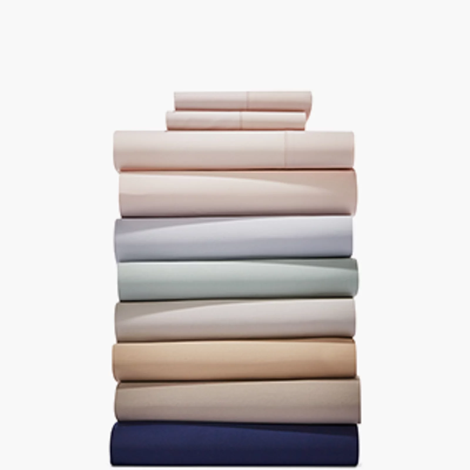 1 photo of stacked bed sheets.