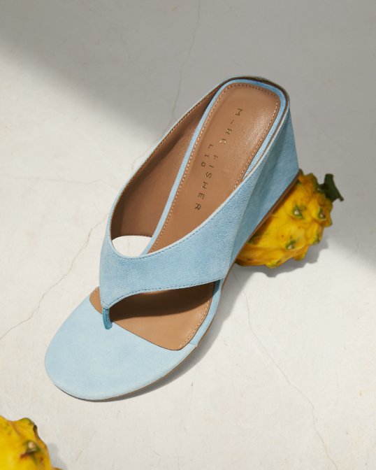 Photo of Marc Fisher pastel blue suede low heeled sandal.