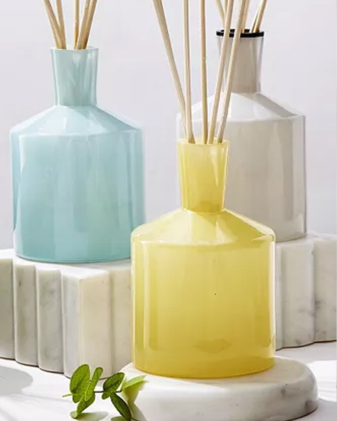 3 diffusers in yellow, light blue and white. Dorm room essentials, decor.