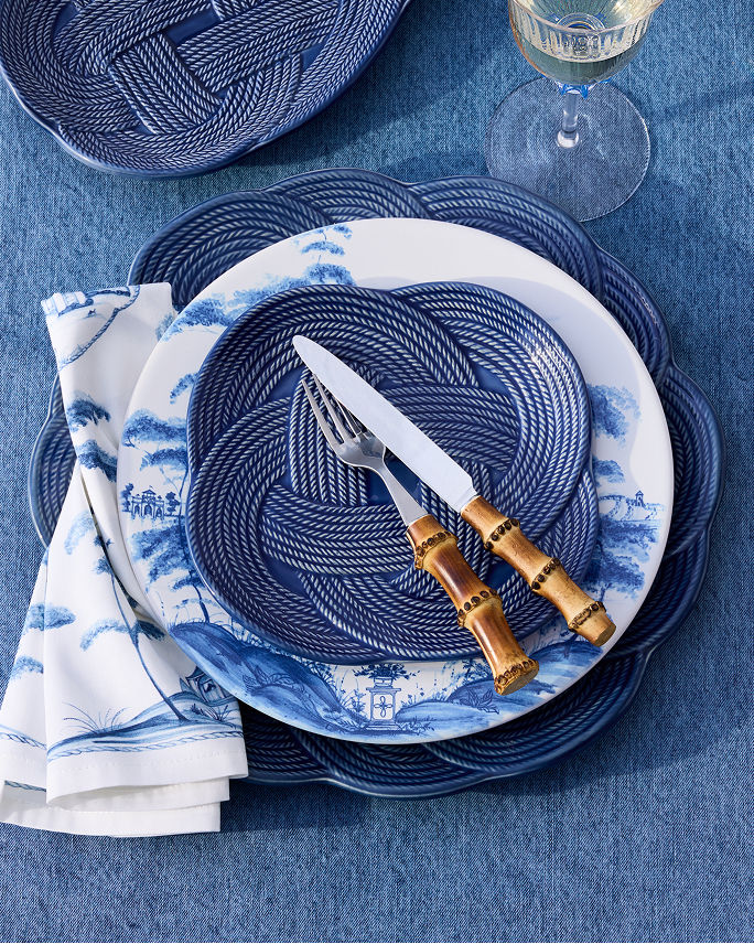 A blue knotted Juliska place setting. Shop Juliska.