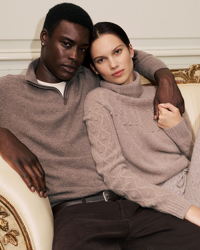 Featured shops. A man & woman in warm gray cashmere tops. Holiday gift guide.
