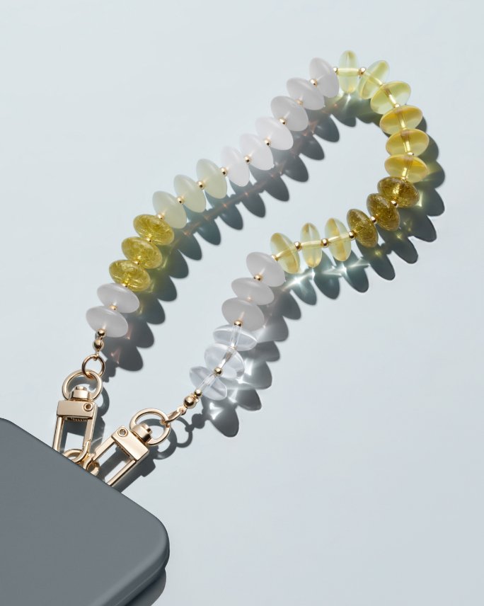 Exclusive free phone wristlet with any beauty purchase of $250 or more.