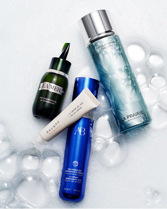 Skincare bottles surrounded by soapy water. Featured shops, skincare.