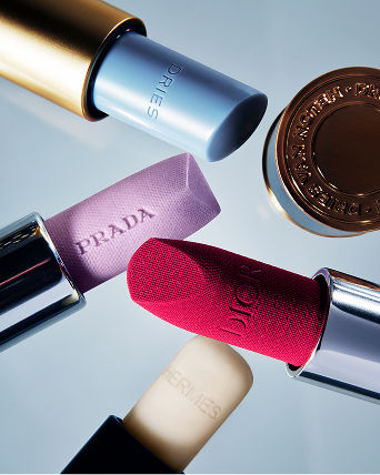 Opened tubes of lipstick. Featured shops, makeup.