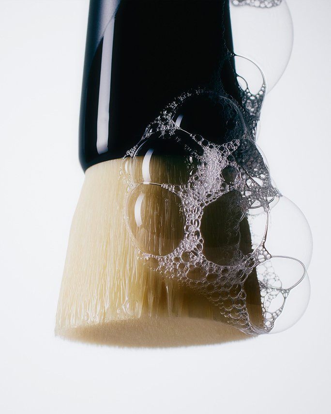 A soapy makeup brush. The skincare guide.