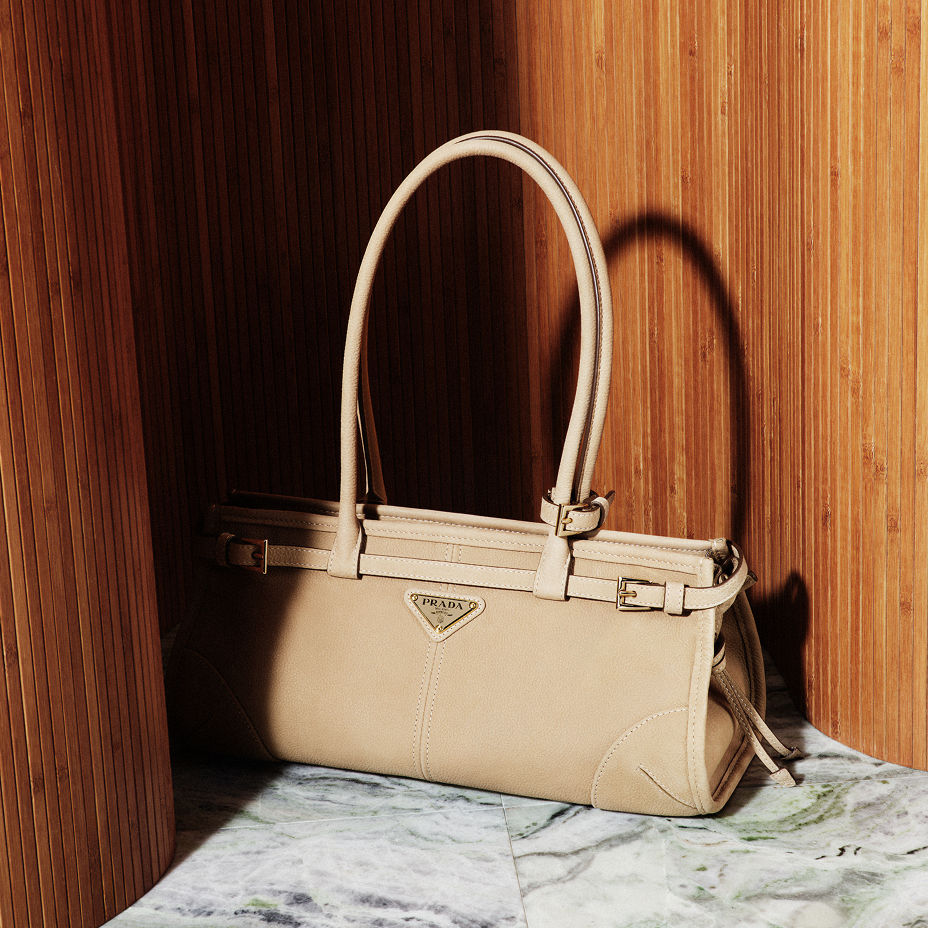 A light beige Prada top handle bag. Pre fall collections, Prada.