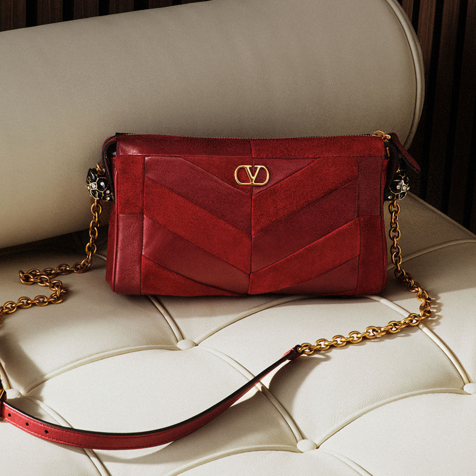 A deep red Valentino Garavani handbag. Pre fall collections, Valentino Garavani.