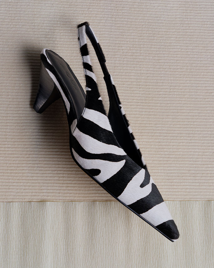 A single zebra stripe print mule. Shop animal prints.
