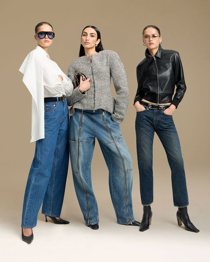 3 women in different jean types. Falls top 10 trends, fashion forward denim.