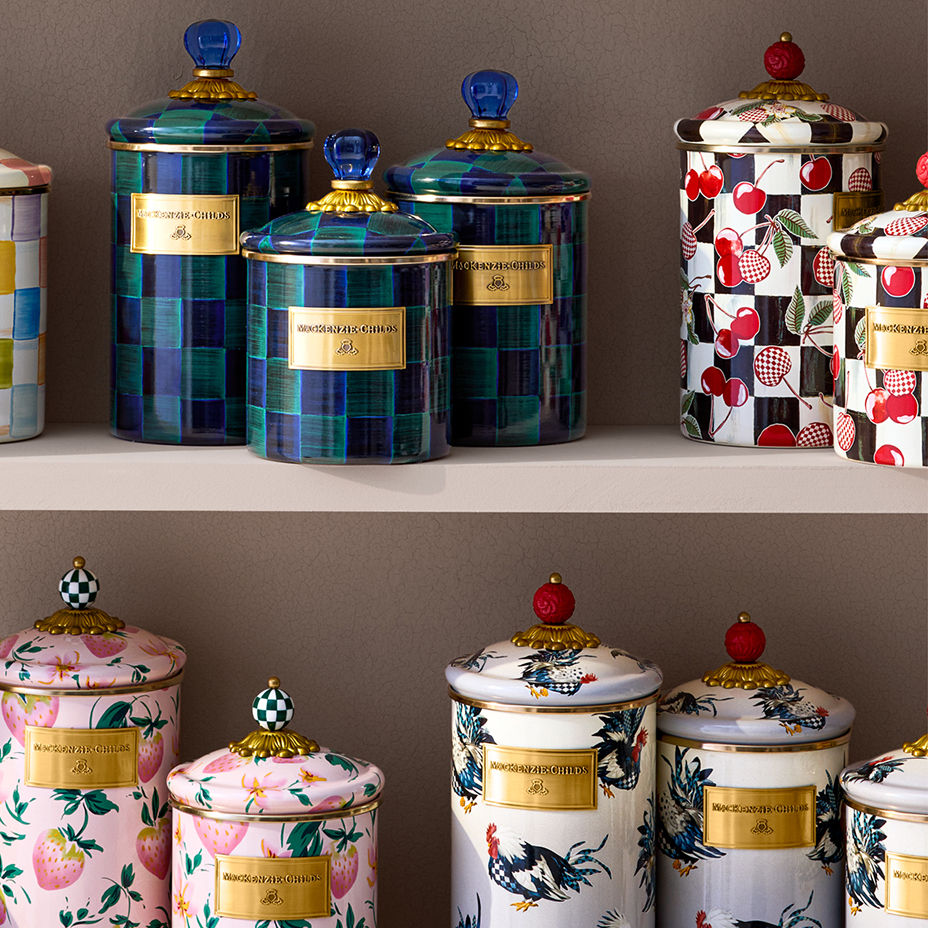Mackenzie Childs. The limited edition canisters boast an array of vibrant, highly collectible prints with hand applied details.
