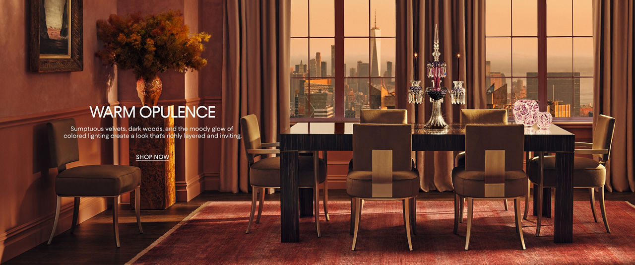 Warm opulence. Sumptuous velvets, dark woods & the moody glow of colored lighting.