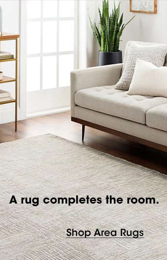 A RUG COMPLETES THE ROOM