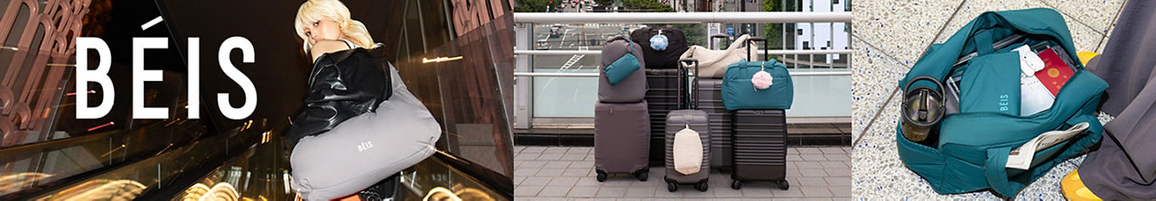 Beis. Beis luggage stacked up, an aqua open Beis tote bag on the floor.