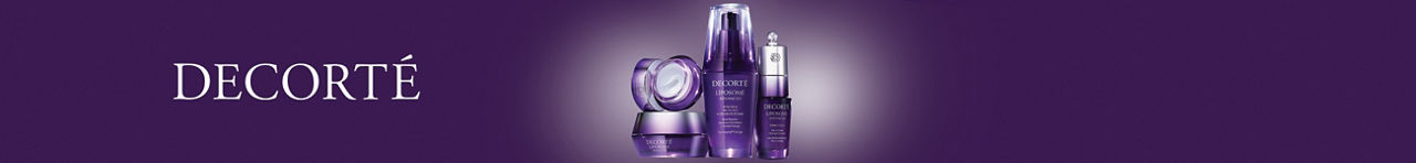 Purple bottles and jars of Decorte skincare.