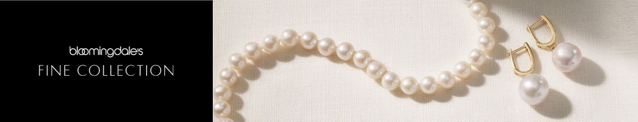 1 photo, of a strand of pearls on a cream linen surface next to a pair of single pearl earrings with  gold backings.