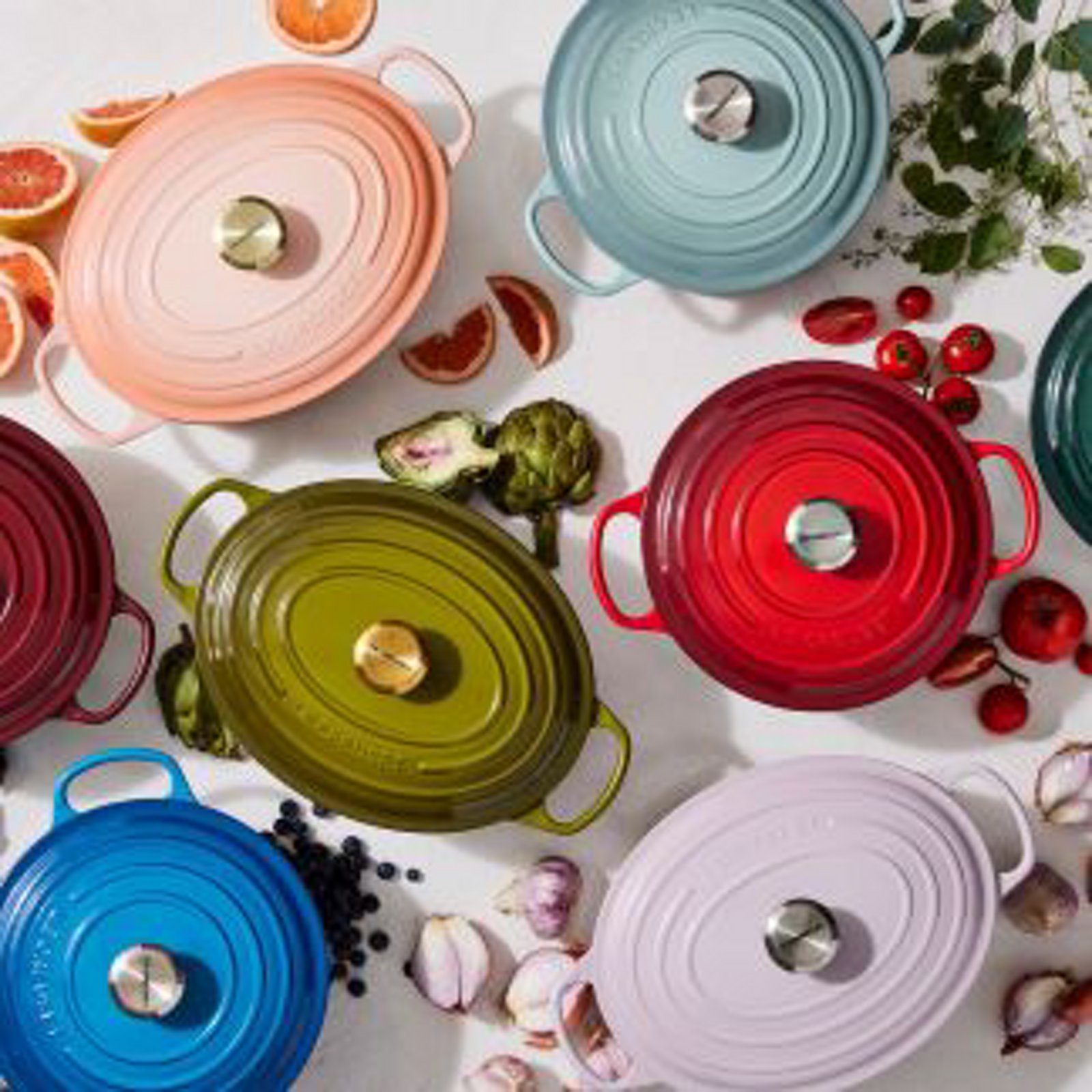 1 photo of red enameled Le Creuset cast iron pot.