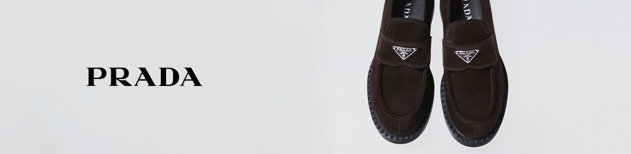 Prada. A pair of mens brown suede loafers.